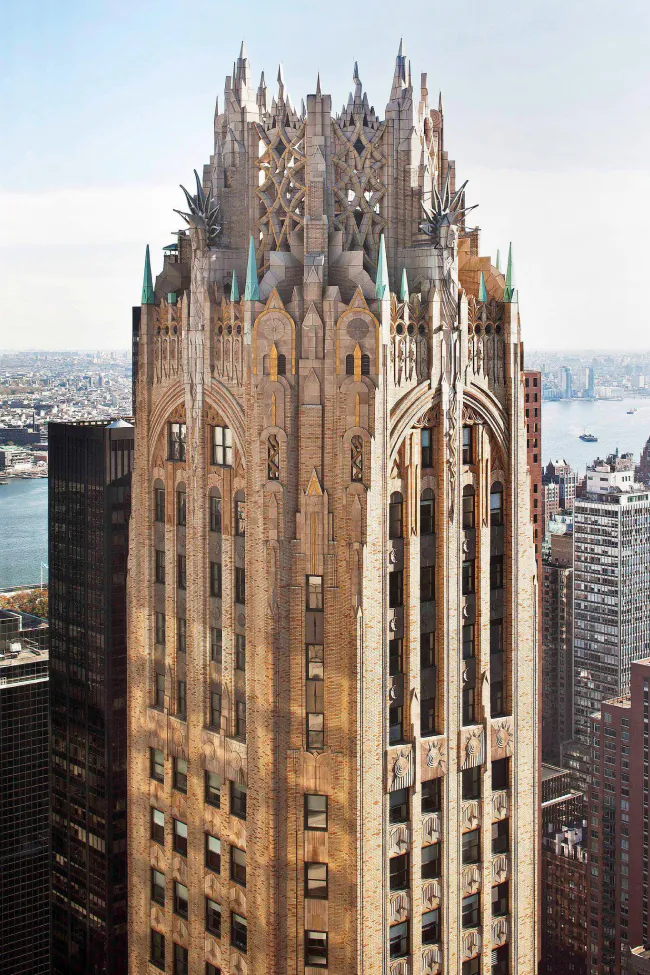 Elaborate decoration symbolizing the power of radio caps the tower